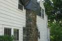 A tree damaged this chimney