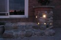 More olive oil lights by the stone door step