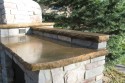 Buffed Concrete Countertop adjacent to the bake oven built by Stichter & Sons Masonry.