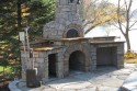 Front left of the outdoor masonry bake oven by Stichter & Sons Masonry.