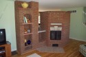 5 sided masonry heater from living room side