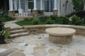 Flagstone walks, patio, benches with covered firepit