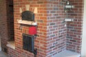 Reclaimed Brick Masonry Heater by Stichter & Sons Masonry. Milford, Indiana. Call (574) 658-4239