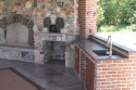 4' fireplace, wood fired bake oven with wood storage below